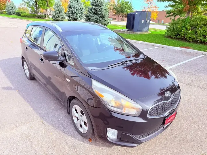 Kia Rondo 2014 photo 4