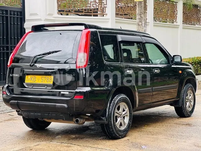 Nissan X-Trail 2004 photo 3