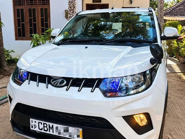 Mahindra Kuv 100