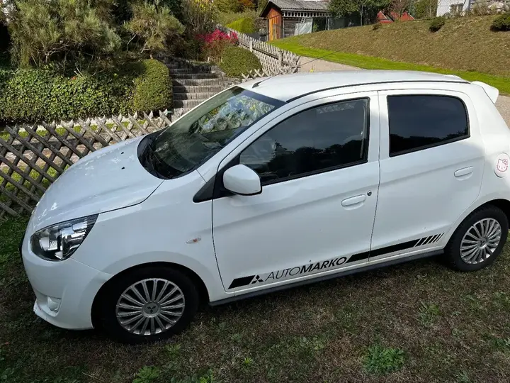 Mitsubishi Space Star 2013 photo 2