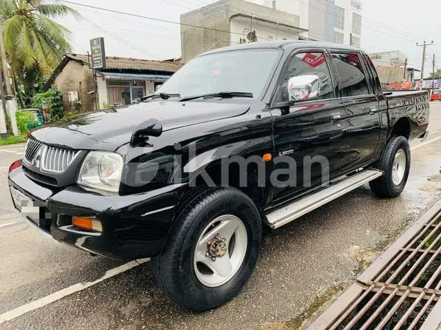 Mitsubishi L200 2006 photo 3