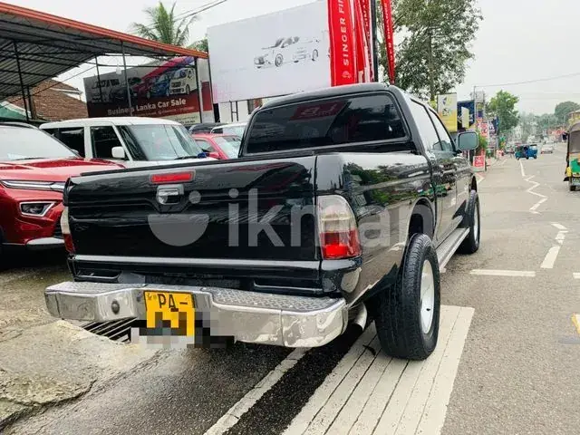 Mitsubishi L200 2006 photo 4