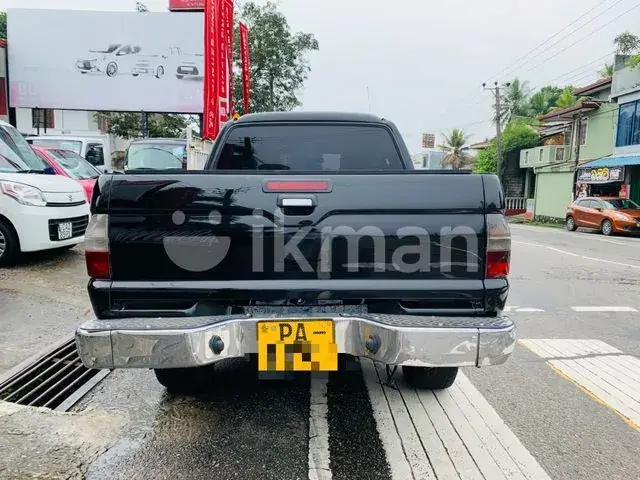 Mitsubishi L200 2006 photo 5