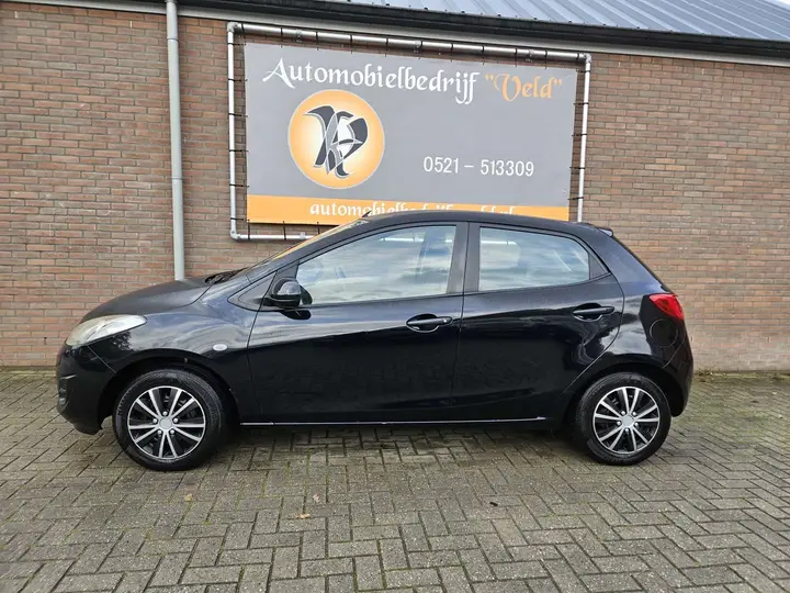 Mazda 2 2013 photo 4