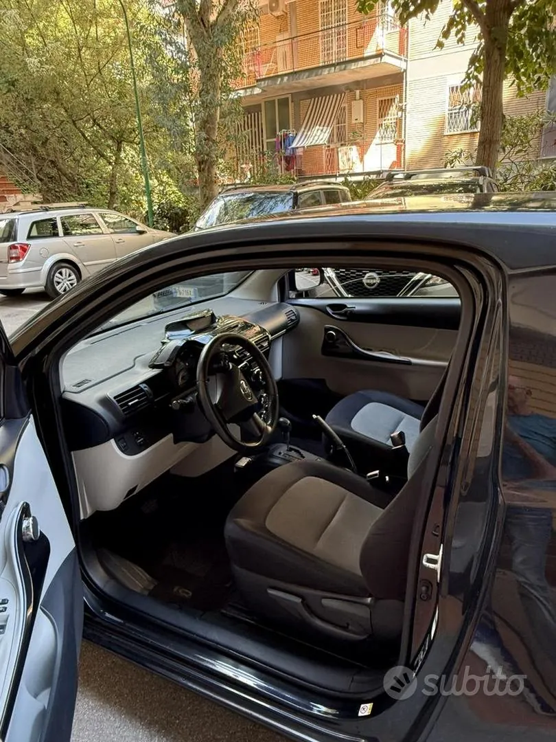 Toyota Iq 2014 photo 5