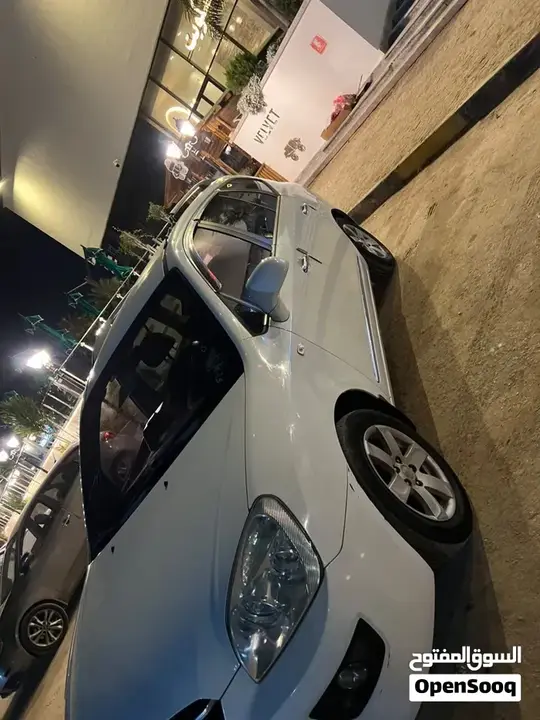 Kia Carens 2009 photo 4