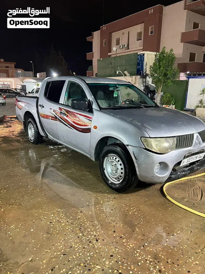 Mitsubishi L200 2009 photo 2