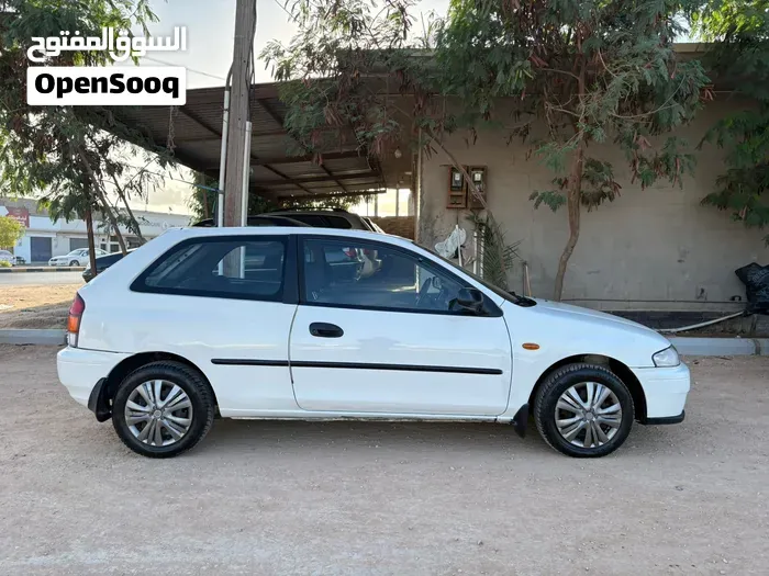 Mazda 323 2002 photo 3