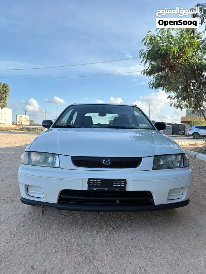 Mazda 323 2002 photo 2