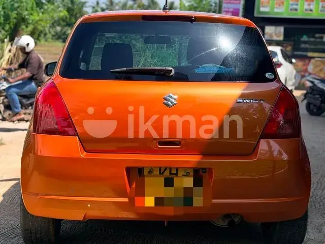 Suzuki Swift 2005 photo 2