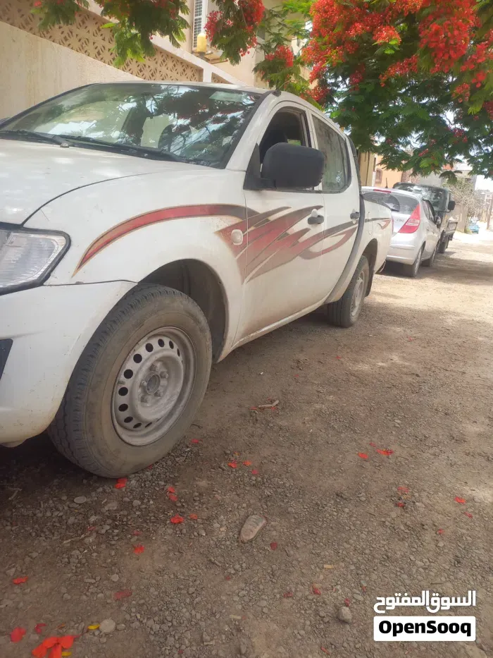 Mitsubishi L200 2012 photo 5