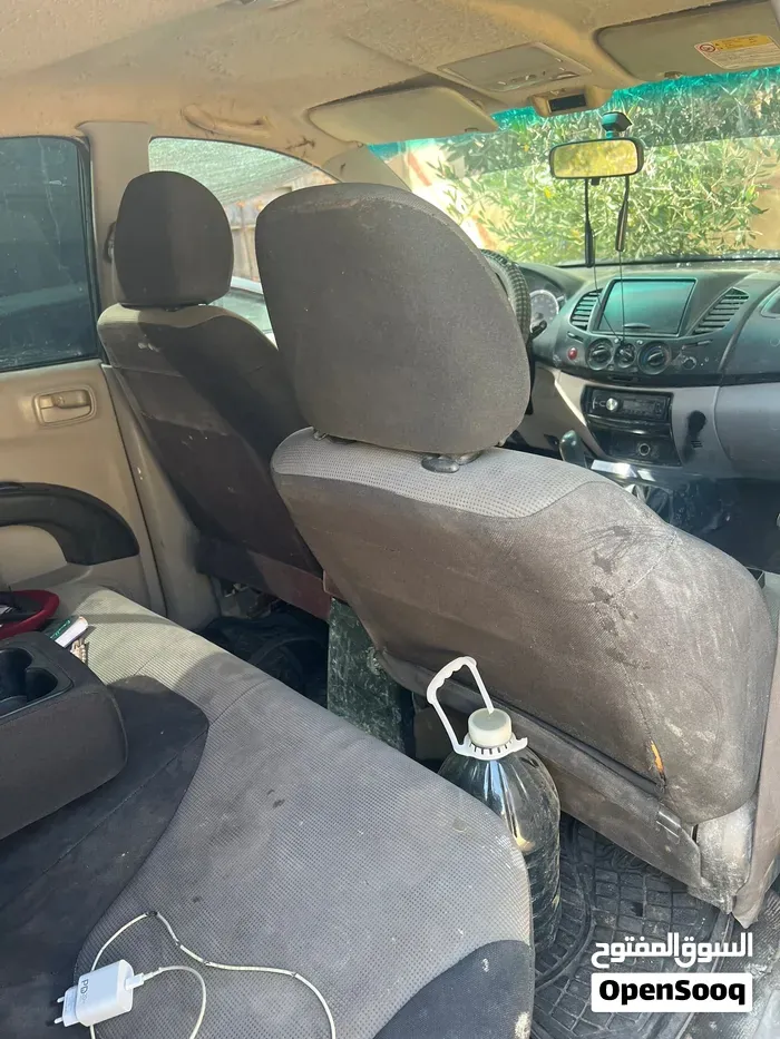 Mitsubishi L200 2012 photo 4