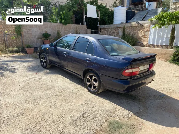 Nissan Almera 1998 photo 2
