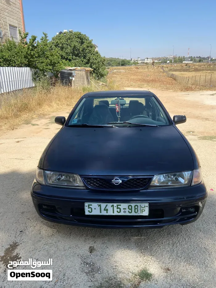 Nissan Almera 1998 photo 3