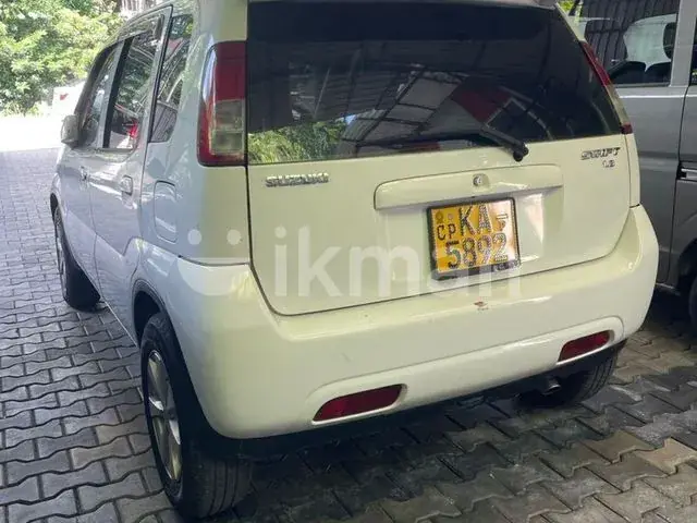 Suzuki Swift 2003 photo 2
