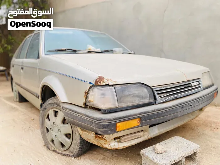 Mazda 323 1988 photo 3