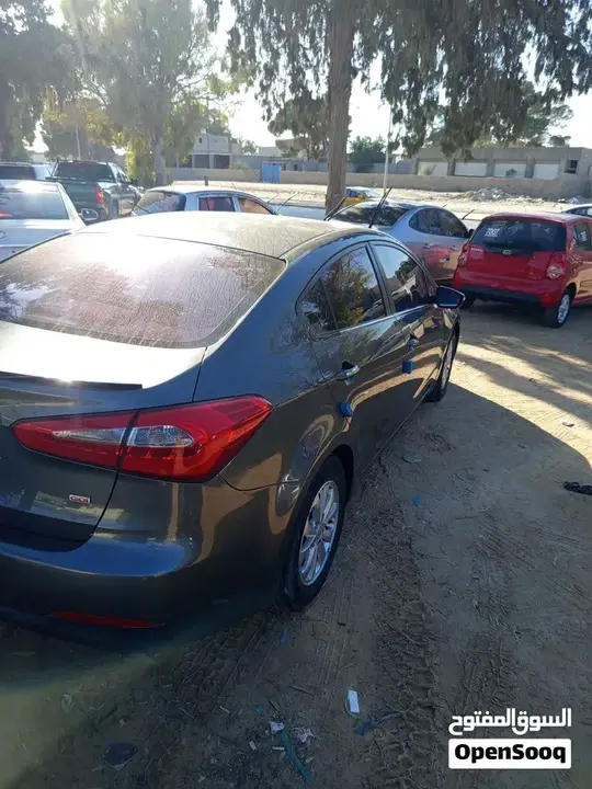 Kia K3 2014 photo 2