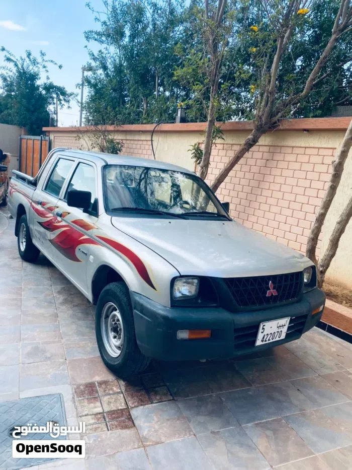 Mitsubishi L200 2004 photo 2