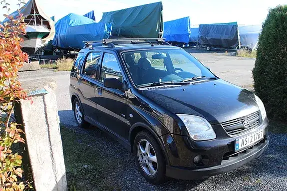 Suzuki Ignis 2009 photo 2