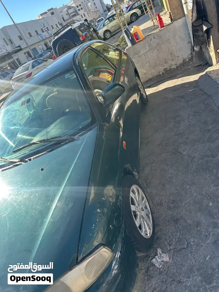 Mitsubishi Colt 2004 photo 3