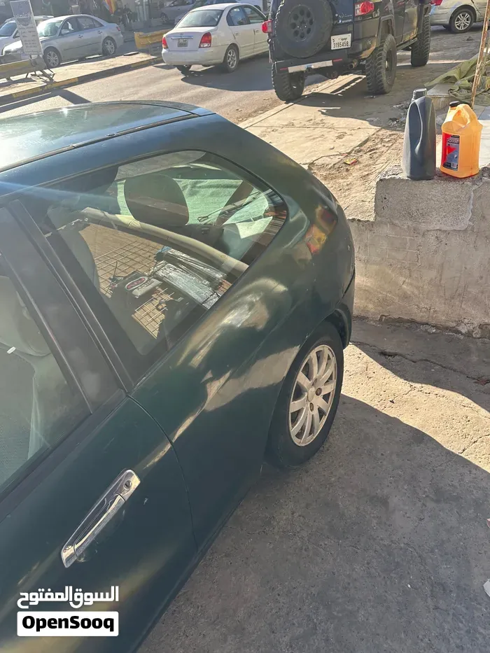 Mitsubishi Colt 2004 photo 2