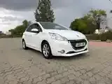 Peugeot 208 2012 photo 2