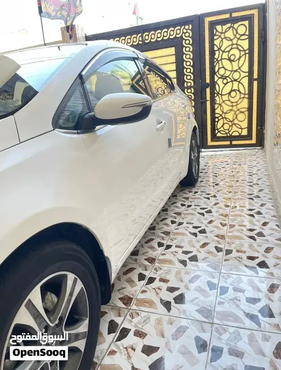 Kia Cerato 2014 photo 2