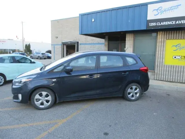 Kia Rondo 2014 photo 2