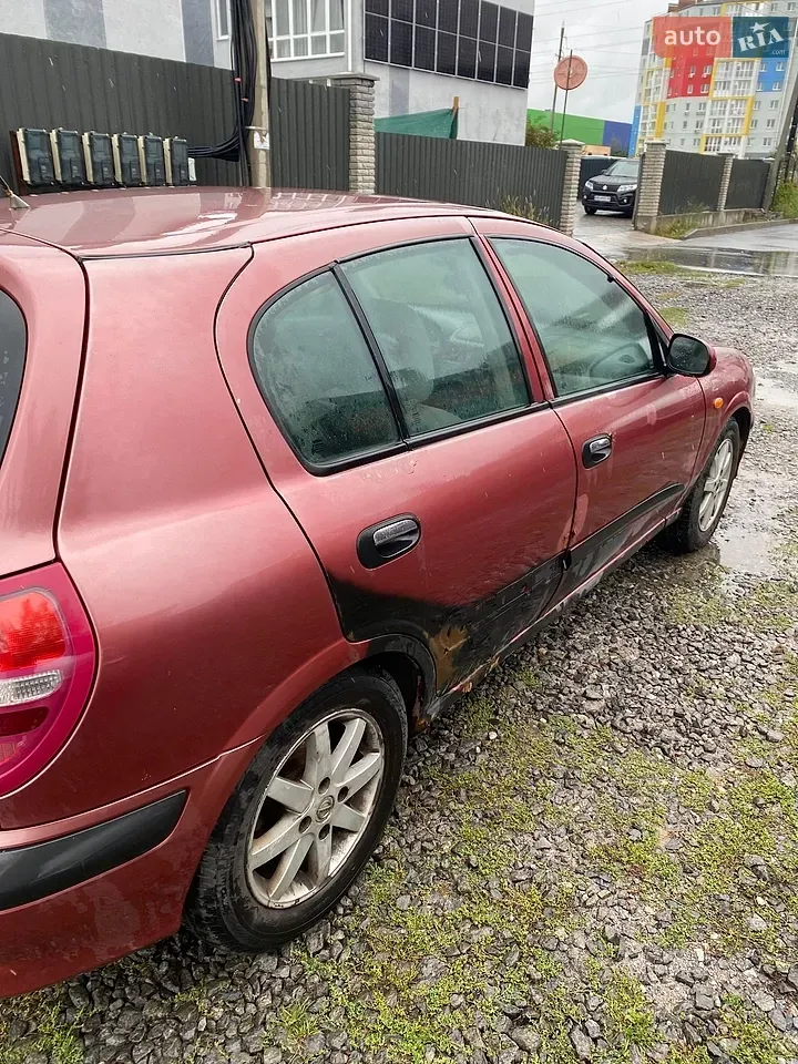 Nissan Almera 2001 photo 3