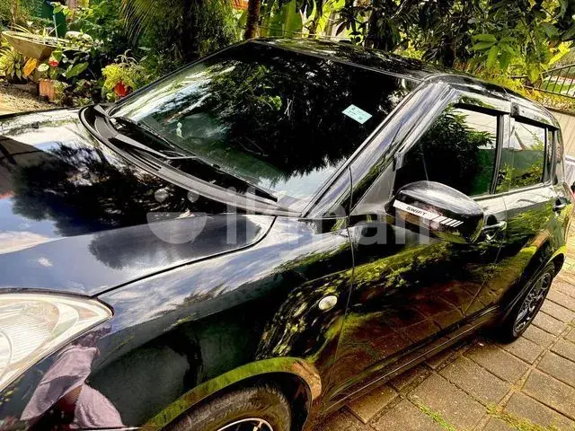 Suzuki Swift 2004 photo 2