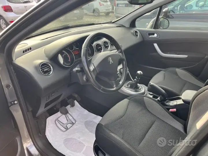 Peugeot 308 2013 photo 3