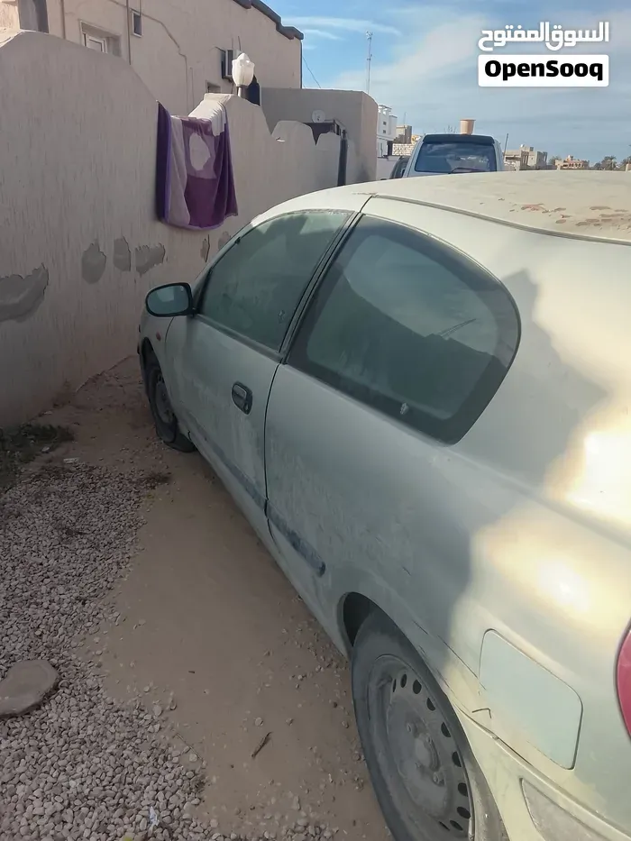 Nissan Almera 2002 photo 3