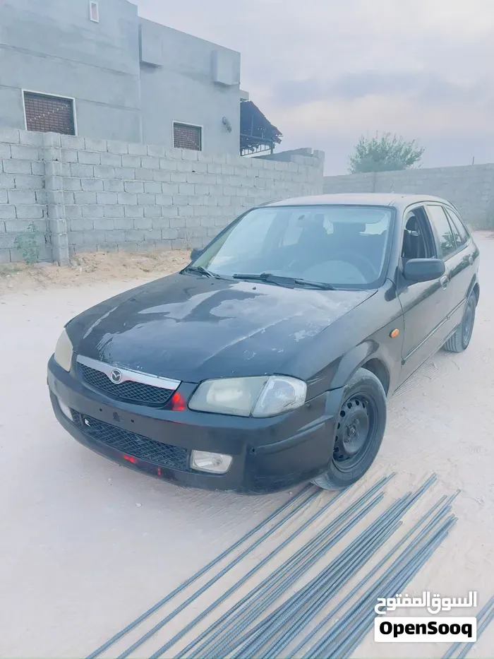 Mazda 323 2000 photo 3