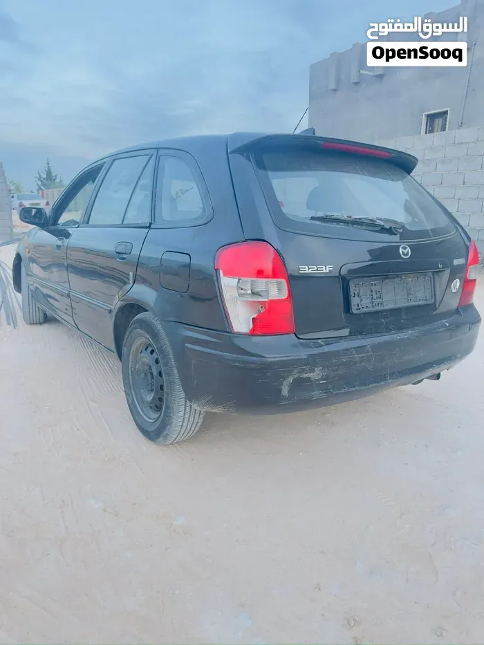 Mazda 323 2000 photo 2