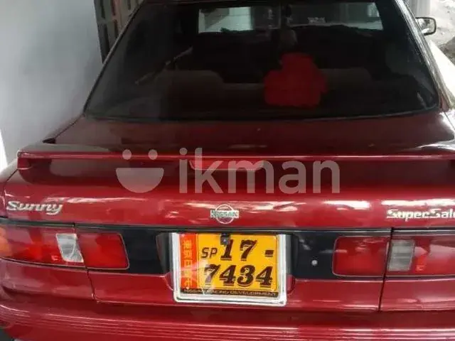 Nissan Sunny 1990 photo 4
