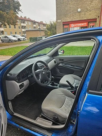 Nissan Almera 2002 photo 4
