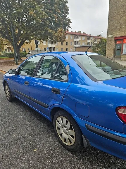 Nissan Almera 2002 photo 2