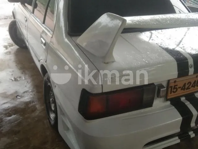 Nissan B11 1985 photo 2