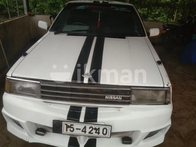 Nissan B11 1985 photo 5