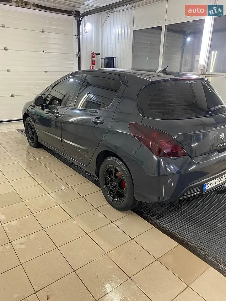 Peugeot 308 2011 photo 2