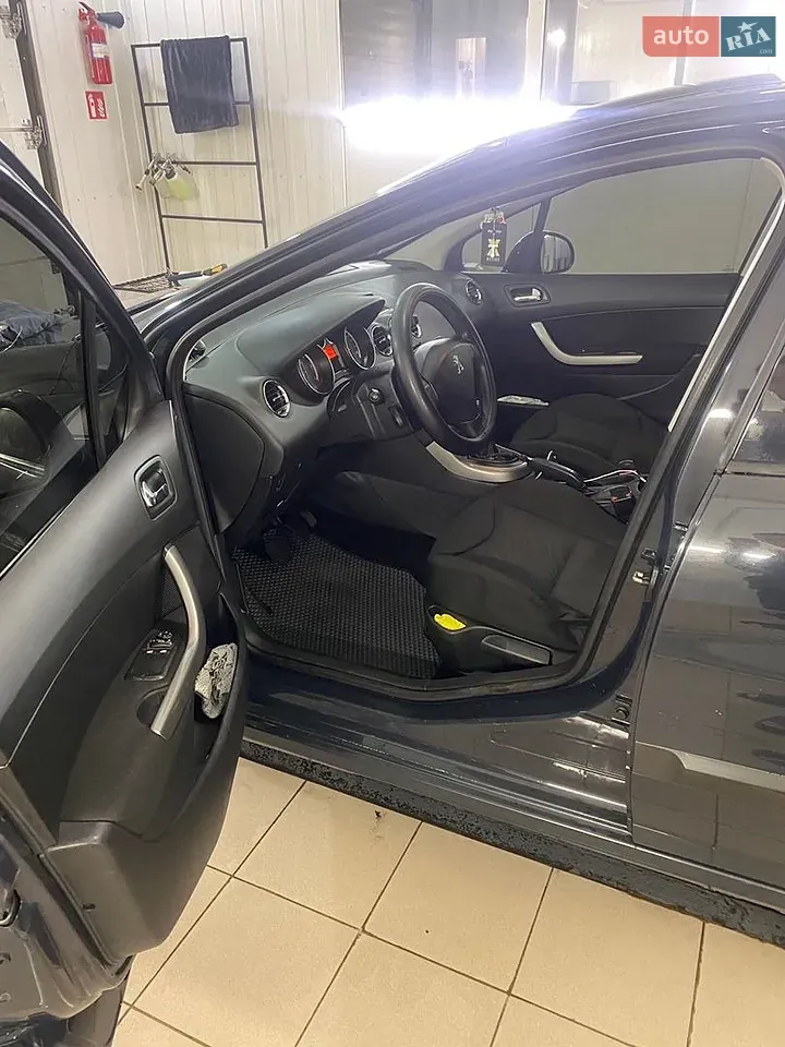 Peugeot 308 2011 photo 4