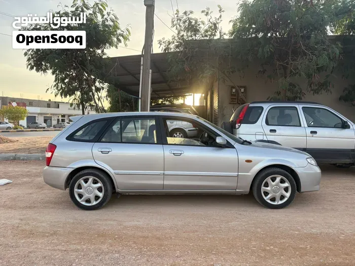 Mazda 323 2004 photo 3