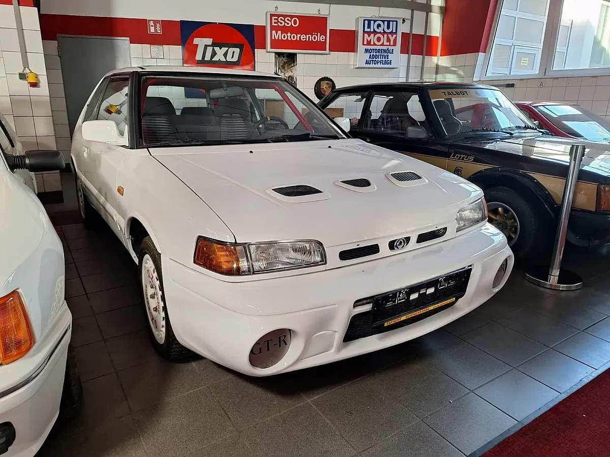 Mazda 323 1995 photo 3