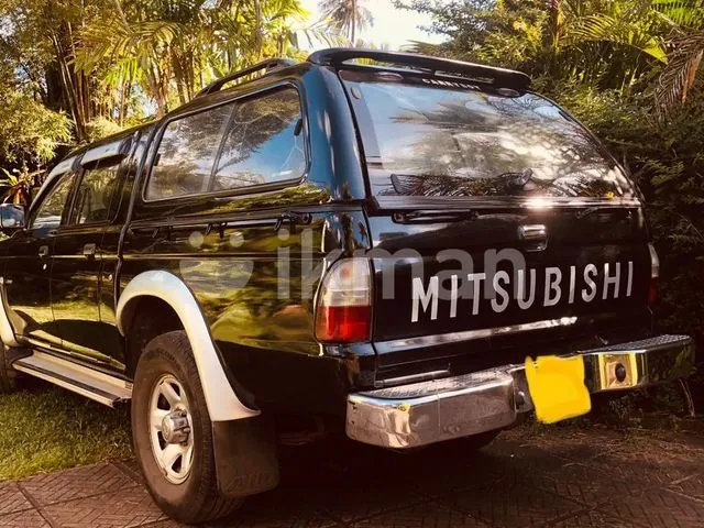 Mitsubishi L200 2005 photo 2