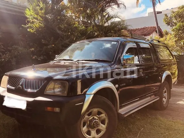 Mitsubishi L200 2005 photo 3