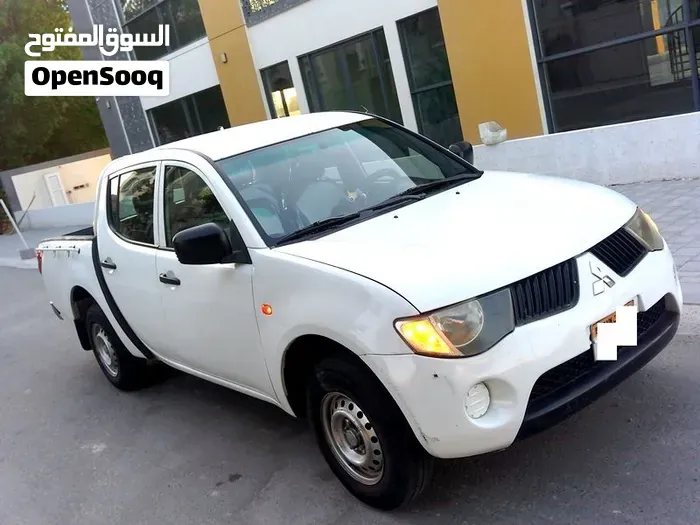 Mitsubishi L200 2009 photo 4