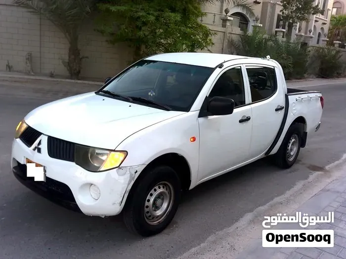 Mitsubishi L200 2009 photo 3