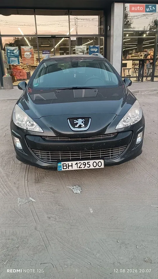 Peugeot 308 2009 photo 2