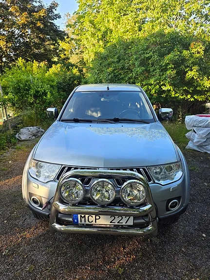 Mitsubishi L200 2012 photo 2