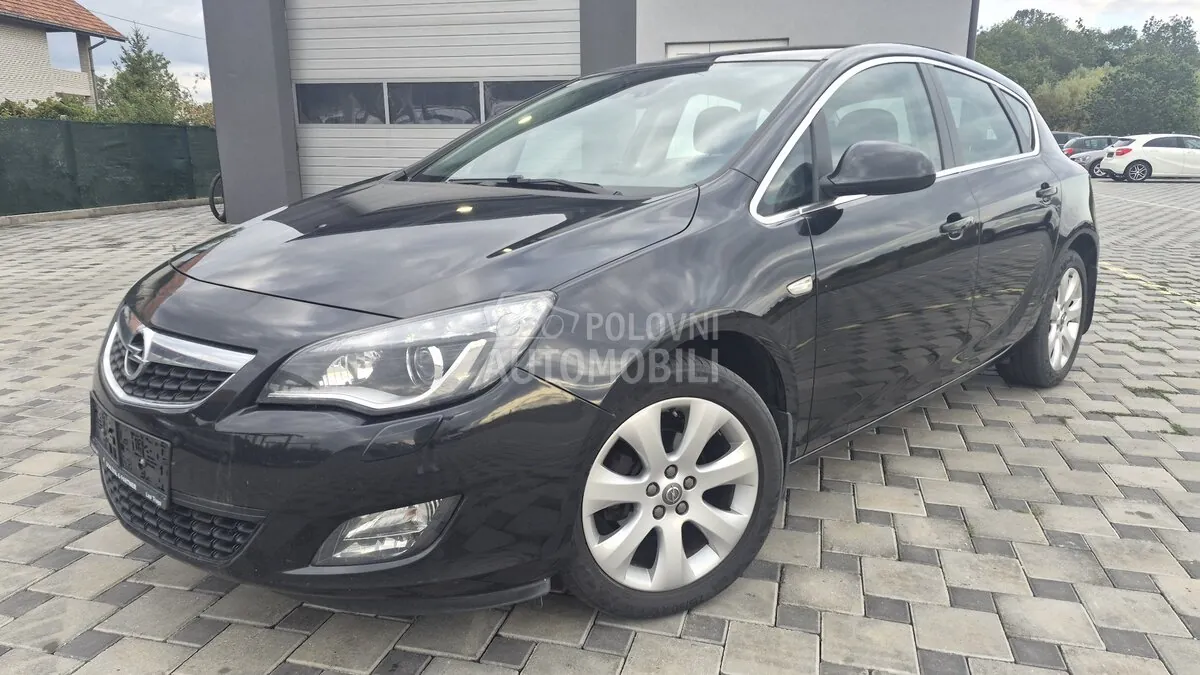 Opel Astra J 2011 photo 4